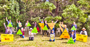 People protecting Oldina Forest, holding up signs saying Save Our Quoll, Save our Devil, Save our Forest