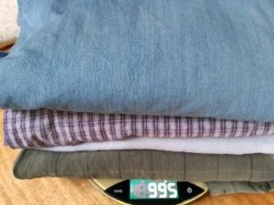 four shirts whose collars have been turned
