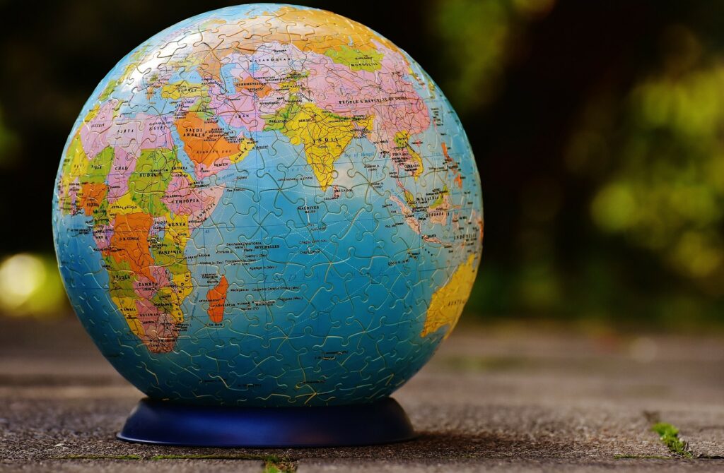 Globe of the world as a jigsaw puzzle.