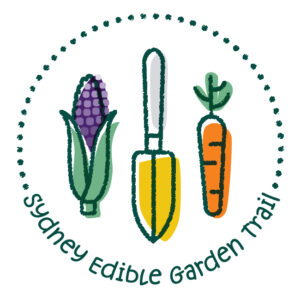 Logo with purple corn, orange garden trowel and red carrot