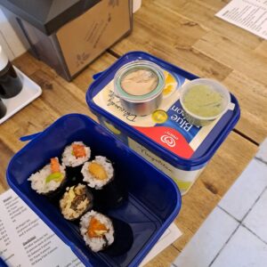 image of Sushi in BYO container - a re-used margarine container